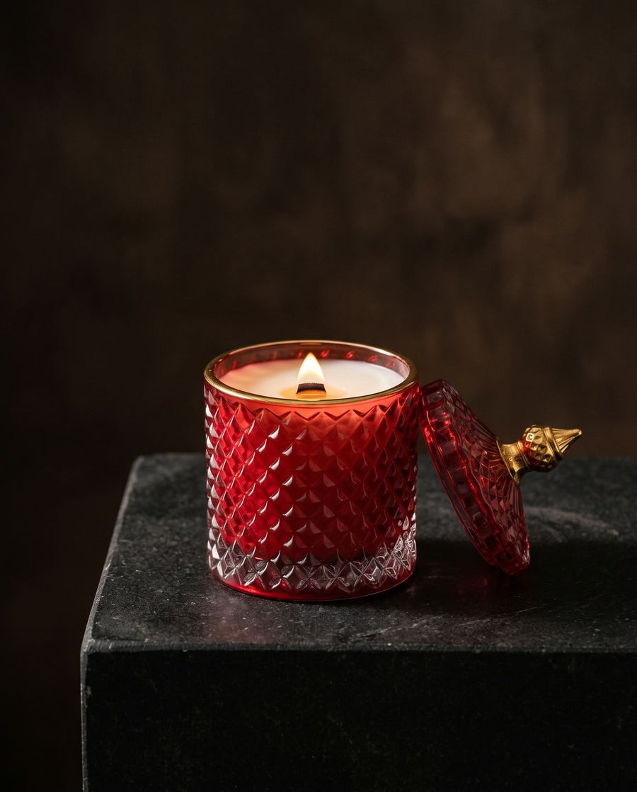 Paradise Punch
 candle by Lili & Koi, Dragon Fruit & Hibiscus
, lit on dark stone